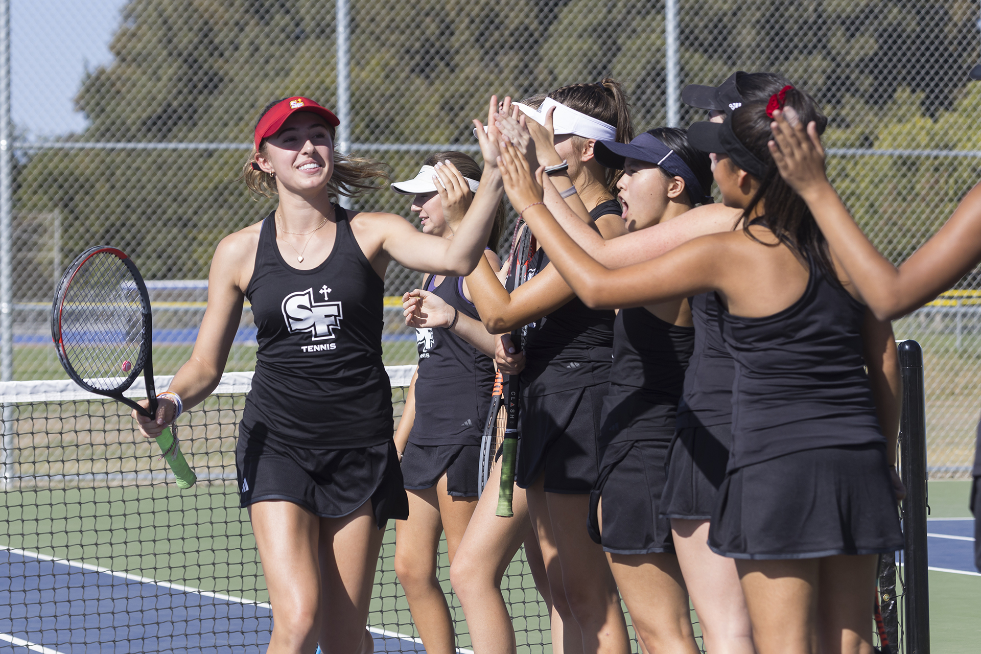 Troubies win top singles but fall overall at Davis